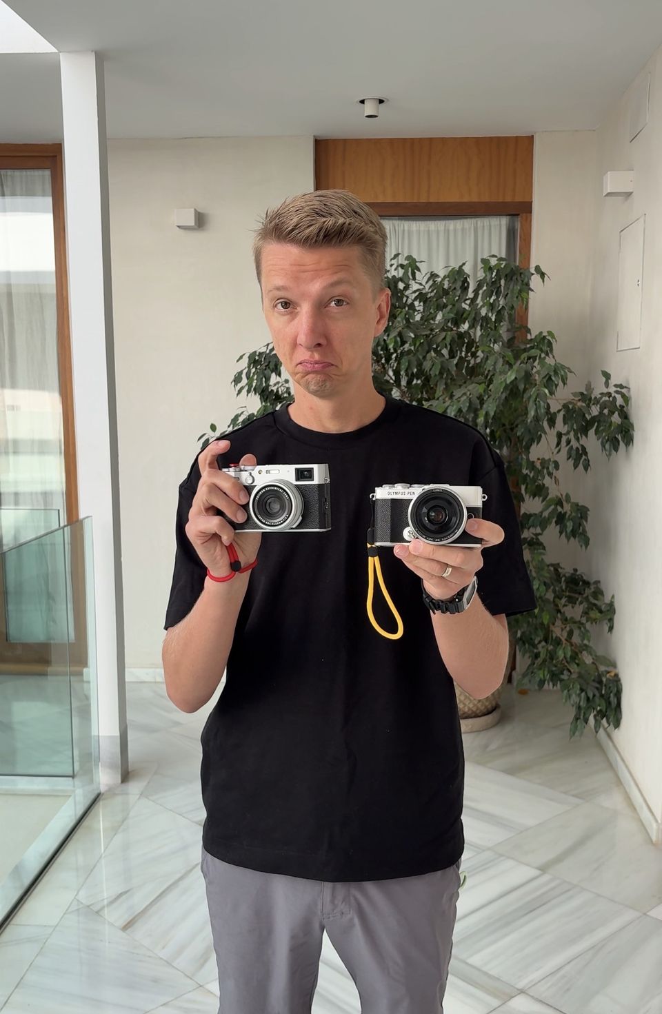 Arthur with a camera in a mirror